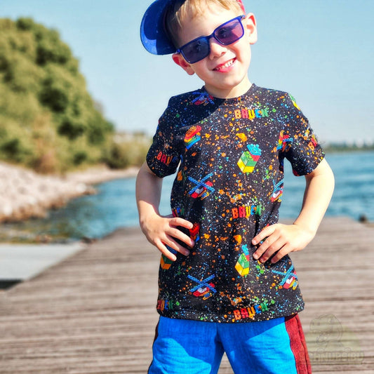 Jersey Stoff „Bauen“ – Bunte Bausteine auf schwarzem Stoff | Schnubsibu OEKO-TEX® Standard 100