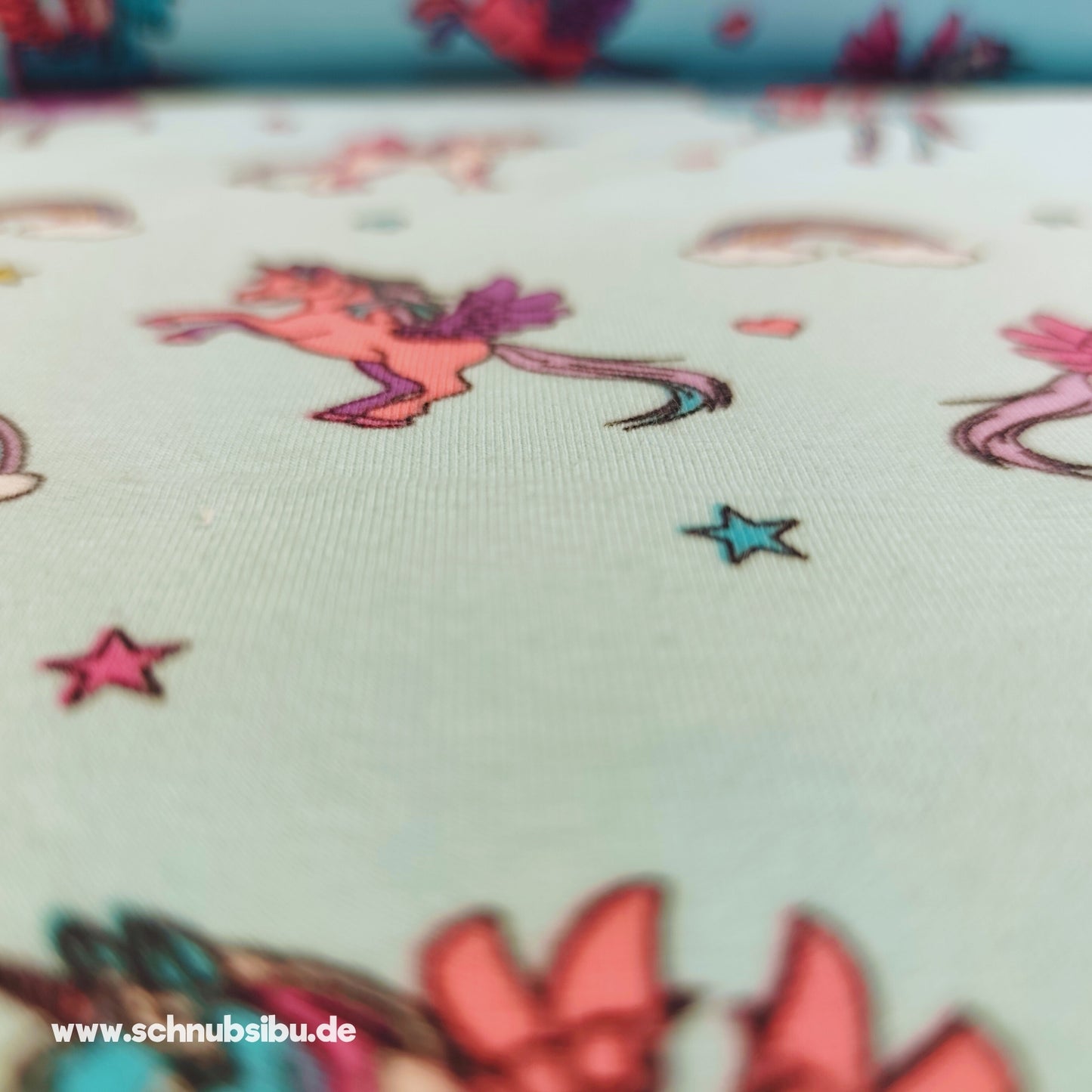 schnubsibu- Produktfoto-einhoernerpetrolstoff_2 -