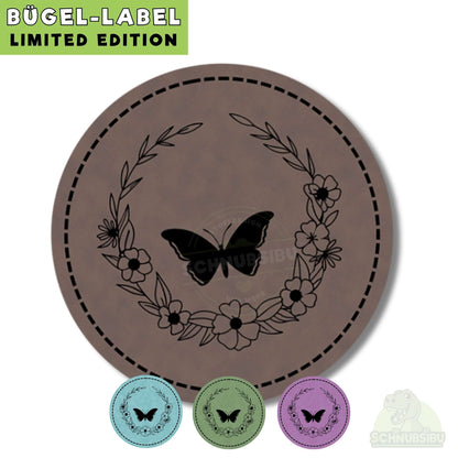 schnubsibu- schnubsibu-titelbild-buegellabel-rund-schmetterlingmitblumenkranz -